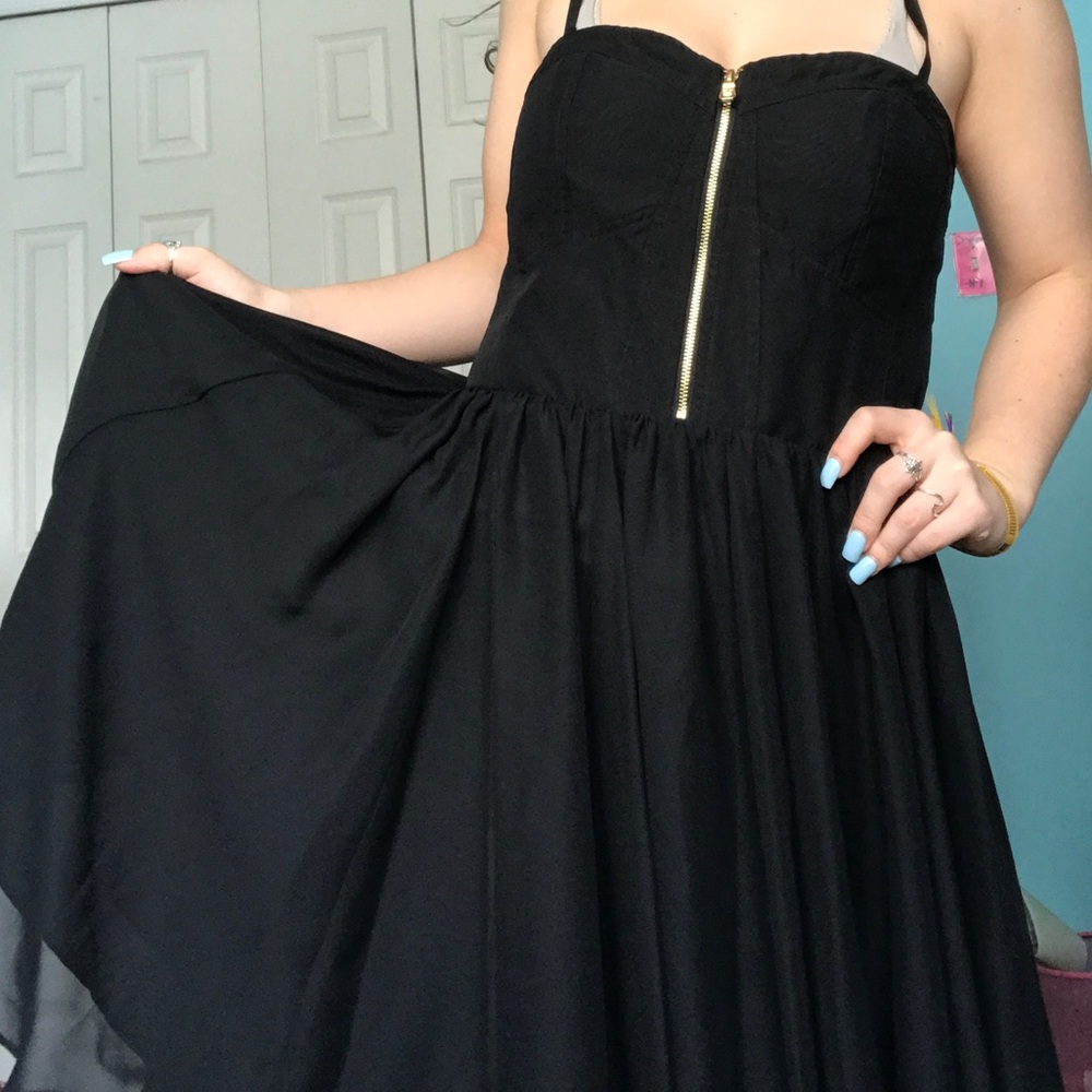 Black corset dress with gold zipper